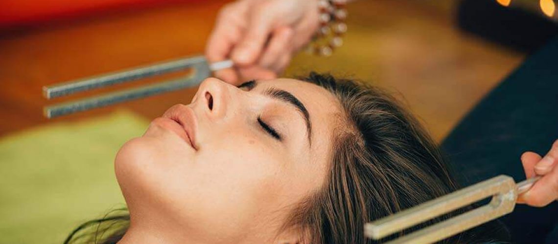 woman learning what is sound healing therapy